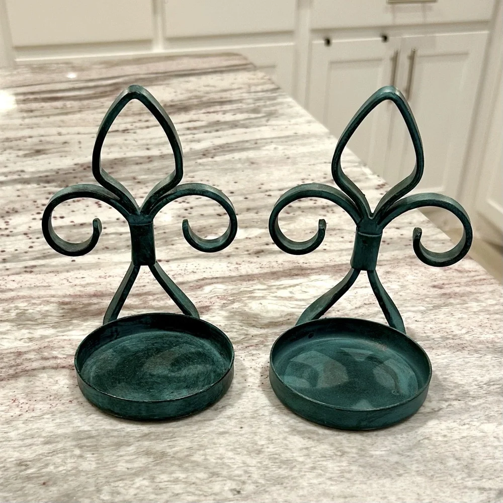 Two metal teal sconces